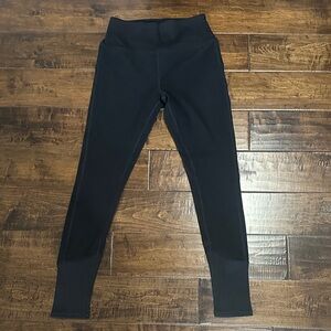 Alo black leggings with ribbed detail.